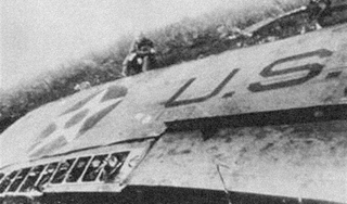 A despondent Doolittle sits by the wreckage of his bomber somewhere in China. Doolittle believed he and his men would be court-martialed for failing to complete the mission safely. Instead, they were all decorated and Doolittle was promoted to the rank of brigadier general. (Author unknown)